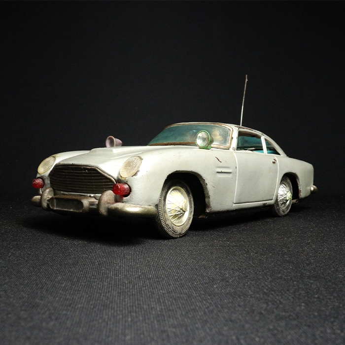 tin toy aston martin car side view 1