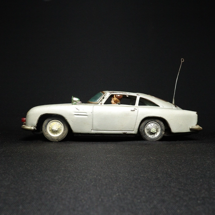 tin toy aston martin car side view 2