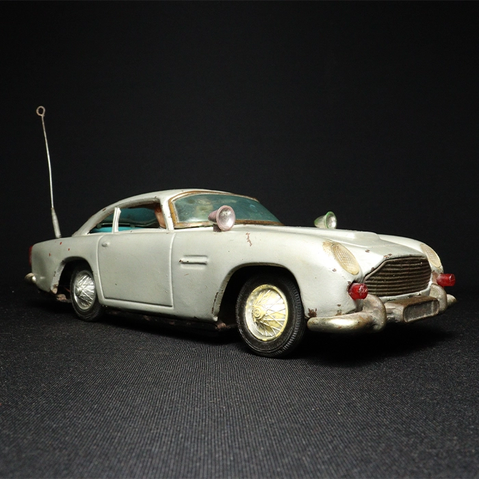 aston martin car tin toy side view 3